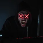 Angry hacker screaming